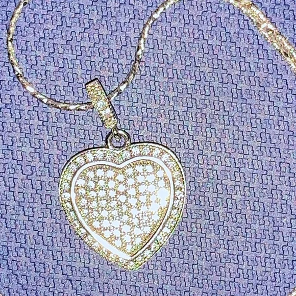 New 1/10 carat paved diamond necklace in sterling silver
